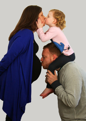 Picture of the 4 of us kissing bump