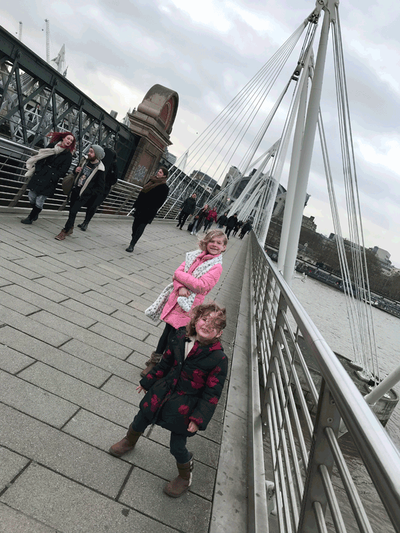 Picture of kids walking across a London bridge