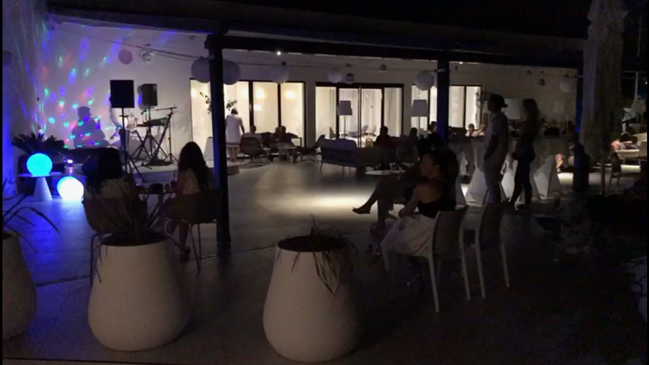 Picture of the mojitio terrace at night with entertainment - Sensimar Adriatic Beach Croatia Review