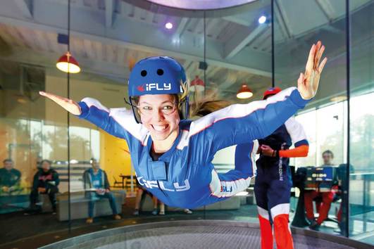 Picture of woman indoor skydiving