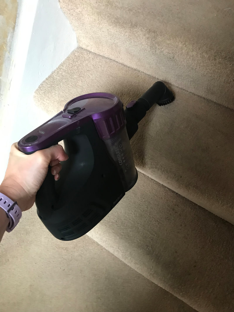 Picture of Beldray Cordless Quick Vac Lite 2 in 1 Vacuum Cleaner on stairs