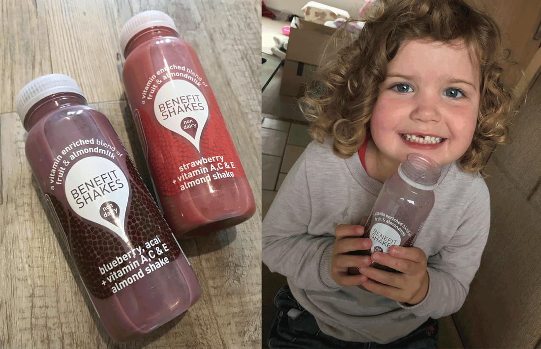 Picture of 2 Benefit shakes bottles and a girl smiling holding a bottle