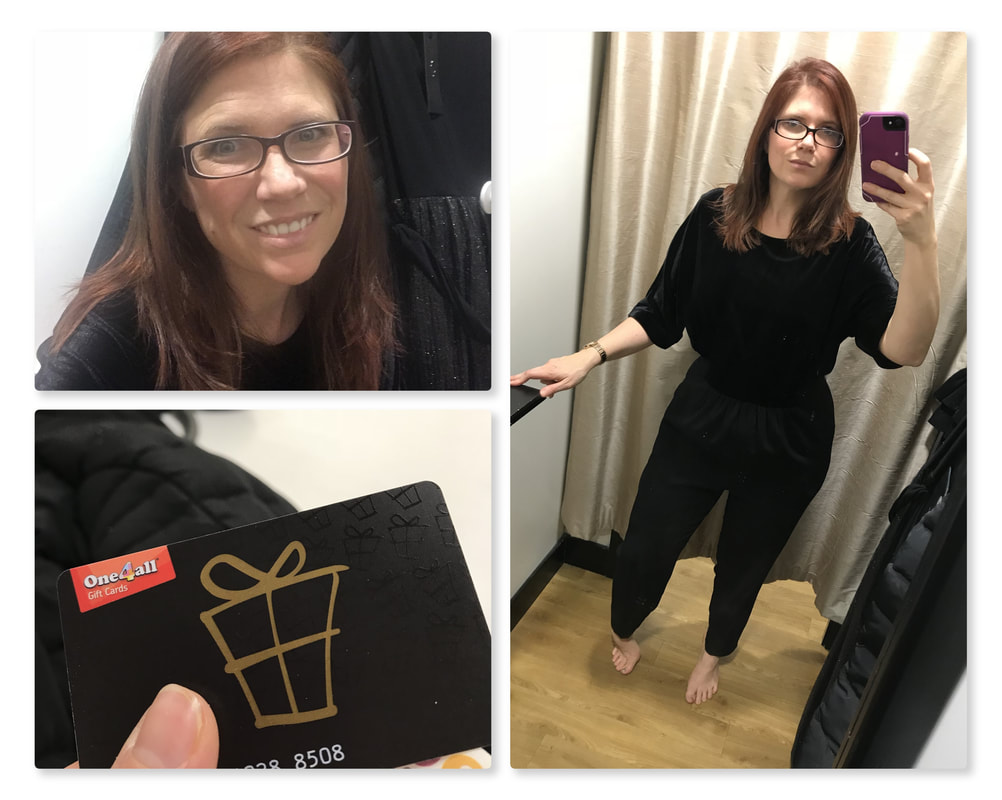 Picture of chosen black jumpsuit with shortsleeves and rushed waist in changing rooms and purchasing with One4all giftcard